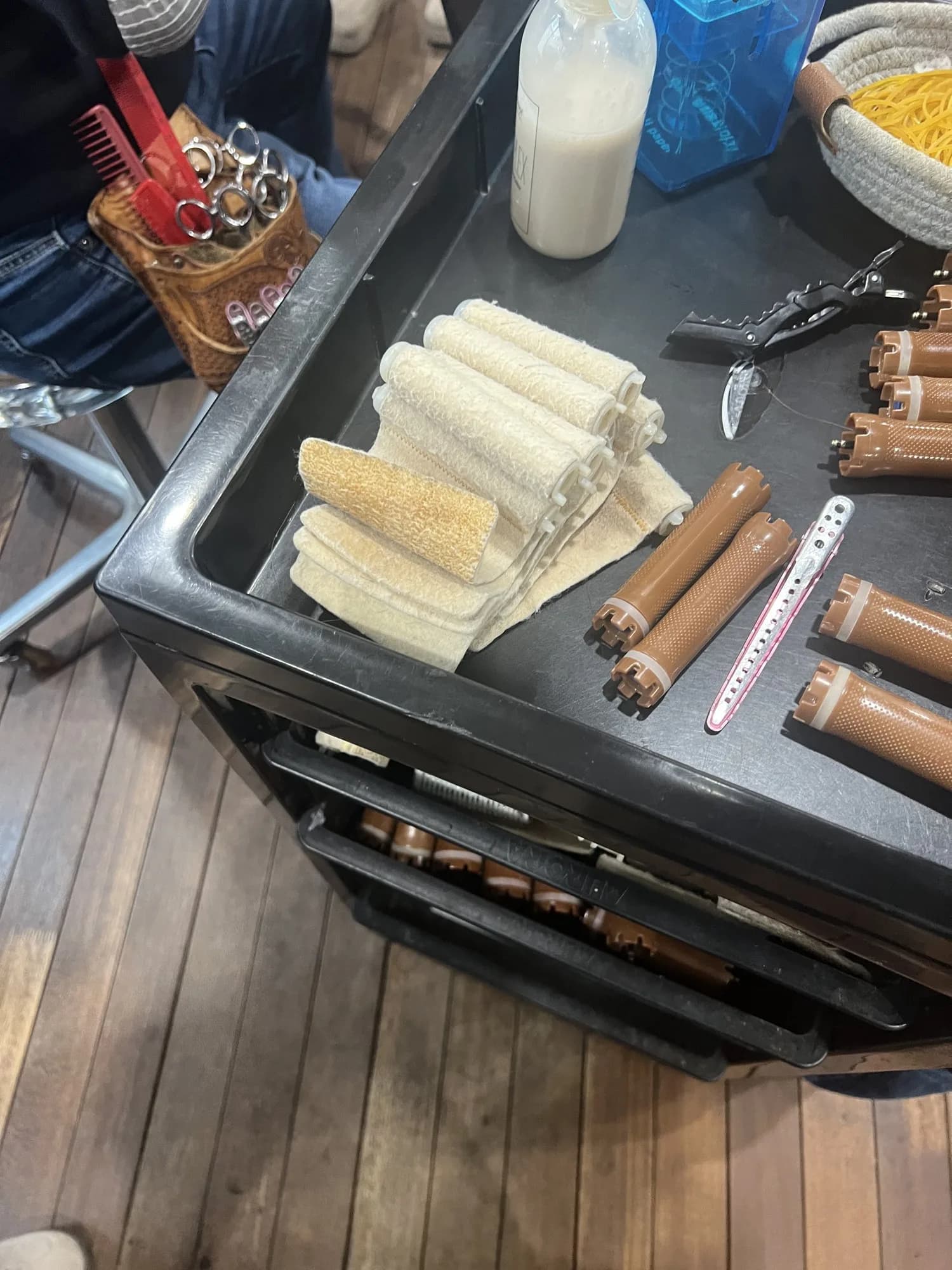 Perm rods and end papers on a stylist's trolley